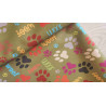 The dog's paws on olive - fully waterproof fabric  with a fold across the frame