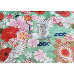 Waterproof Fabric - Cranes and flowers on light green, close up on the crane