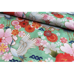 Waterproof Fabric - Cranes and flowers on light green, the capture with the fold