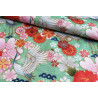 Waterproof Fabric - Cranes and flowers on light green, the capture with the fold