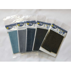 set of denim fabric sheets placed on a white background