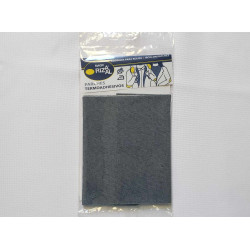Iron-on denim fabric sheet - medium blue denim color, placed on a white background