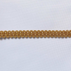 pholstery braid 14mm - Gold Beige color, a strip of the gimp placed on a white background