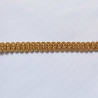 pholstery braid 14mm - Gold Beige color, a strip of the gimp placed on a white background