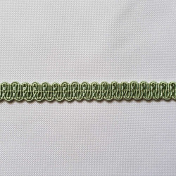 pholstery braid 14mm - light Green color, a strip of the gimp placed on a white background