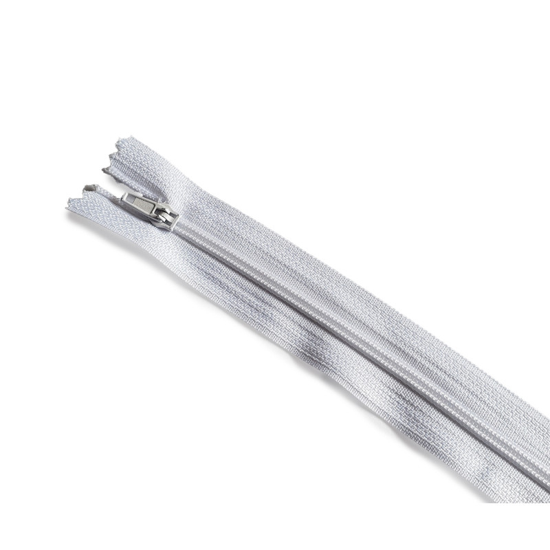 plastic coil zip size3 - white - 45cm - closed end zip, placed across the frame on a white background plastic coil zip size3 - white - 45cm - closed end zip, placed across the frame on a white background