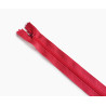 plastic coil zip size3 - coral- 45cm - closed end zip, placed across the frame on a white background