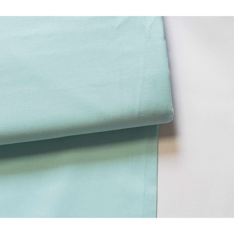 medium-weight cotton fabric -  Aqua color, the fabric with the fold, placed across the frame