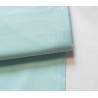 medium-weight cotton fabric -  Aqua color, the fabric with the fold, placed across the frame