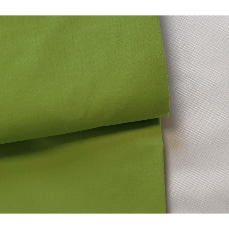 medium-weight cotton fabric -  Apple green color, the fabric with the fold, placed across the frame