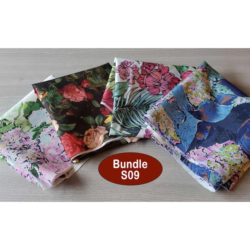 Outdoor fabric remnants bundle- 4 pieces of floral designs placed on a white wooden background