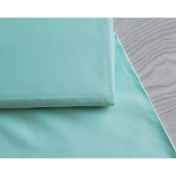medium-weight cotton fabric -  Mint color, the fabric with the fold, placed across the frame