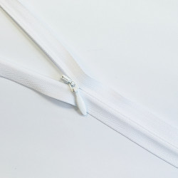 YKK closed-end invisible zip- white - 65cm placed across the frame, on a white background