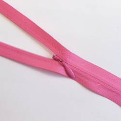 YKK closed-end invisible zip- Fuchsia - 65cm placed across the frame, on a white background