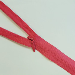 YKK closed-end invisible zip- Red - 65cm placed across the frame, on a white background