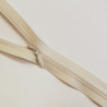 YKK closed-end invisible zip - light beige - 65cm placed across the frame, on a white background