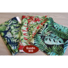 Outdoor fabric remnants bundle - tropical designs - 3 pieces, placed on a grey table