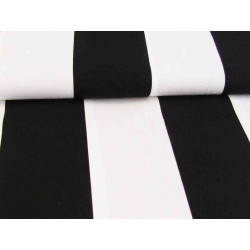 Wide black&white stripes - medium-weight cotton fabric, placed on a table with a fold