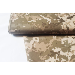 Soft shell fabric- military pixels camouflage, the photo shows the fabric with the fold across the frame