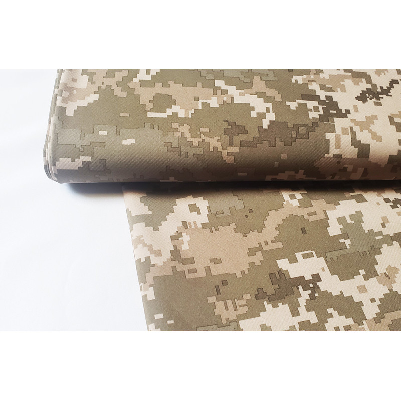 Soft shell fabric- military pixels camouflage, the photo shows the fabric with the fold across the frame