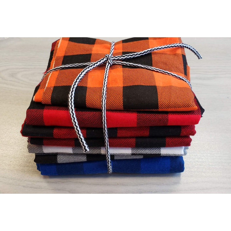 Brushed cotton fabric -  Buffalo check - remnant bundle- 2,4m in total,  tied with a colorful cord, placed on a table,