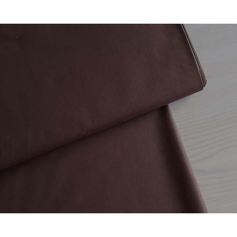 medium-weight cotton fabric - dark brown color, the fabric with the fold, placed across the frame