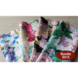Outdoor fabric remnants bundle - floral designs mix, 4 pieces of the fabric, placed on a table