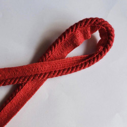 Cotton flanged rope  piping cord 6mm - Red, twisted, placed on a white background