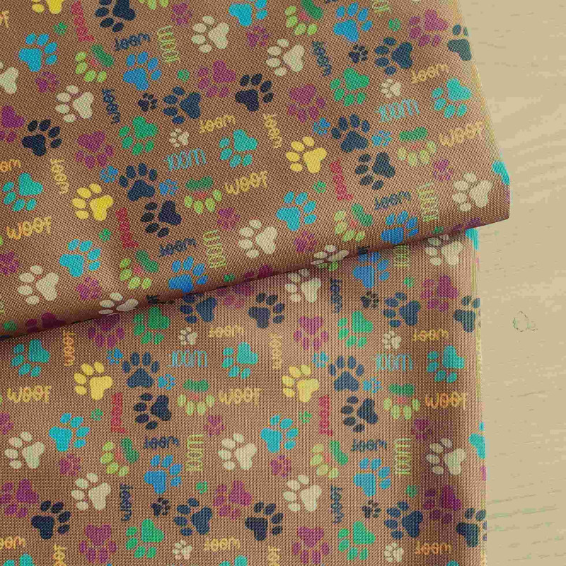 The  mini dog's paws on brown - fully waterproof fabric  with a fold across the frame.