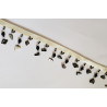 shell pieces bead fringing - cream - 4,5cm long, placed on a white background