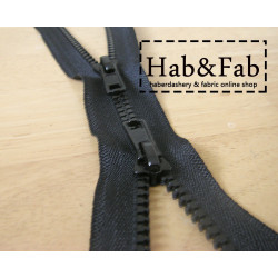 double slider chunky zip - black - 95cm placed on a wooden background