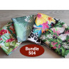 water-resistant fabric remnants bundle - tropical designs, placed on a wooden table
