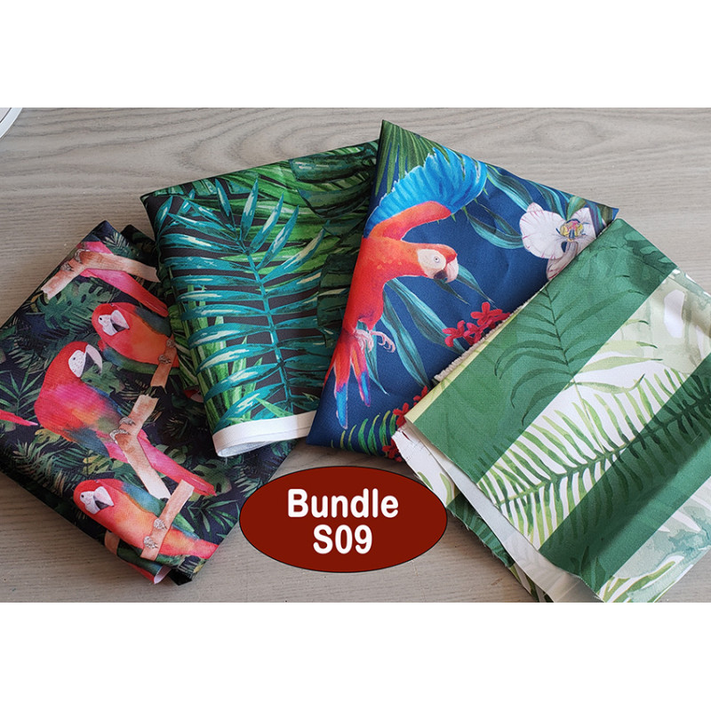 Outdoor fabric remnants bundle - tropical designs- 4 pieces, placed on a table