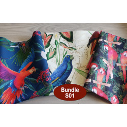 Outdoor fabric remnants bundle - mix of parrot designs- 3 pieces placed on table
