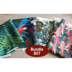 Outdoor fabric remnants bundle - 4 pieces- tropical designs, placed on a table