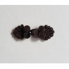 Frog fastener- dark brown with beads, placed on a white background