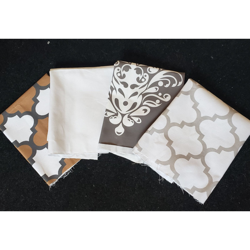 Cotton canvas remnants bundle - ornamental design- 4 pieces of the fabric , placed on a dark color background
