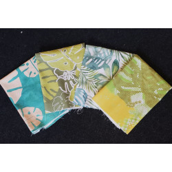Cotton canvas remnants bundle - tropical monstera design- 4 pieces of the fabric placed on a dark background