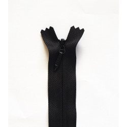 invisible zip size 5 - off white - 60cm long, placed on a white background, close up on the zip slider