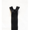 invisible zip size 5 - off white - 60cm long, placed on a white background, close up on the zip slider