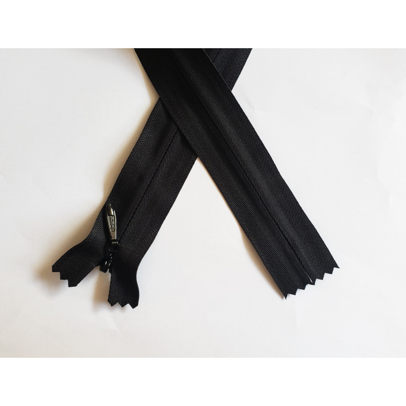 Invisible zip size 5 - black - 65cm from YKK brand. The zip is placed on a white background