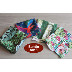 Outdoor fabric remnants bundle - TROPICAL PRINT BUNDLE- 4 pieces of fabric, placed on a table